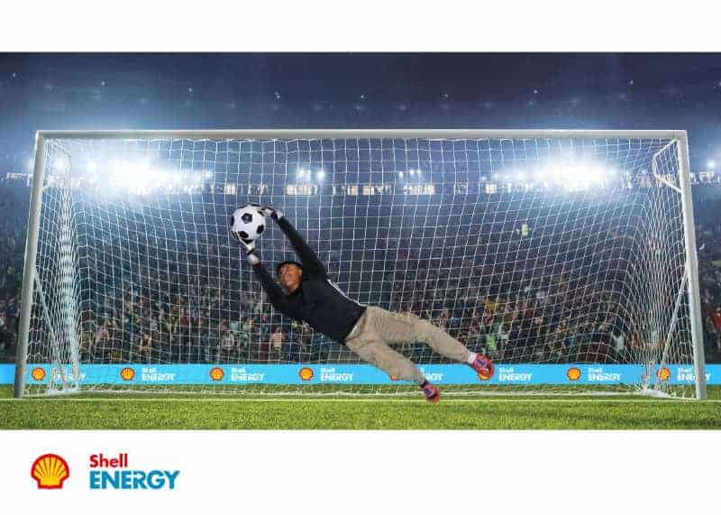 A participant saves the goal at this Chicago green screen photo booth event for Shell Energy.