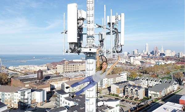 Washington, DC green screen photo booth for Dish Network A participant "hangs" from a 4D cell phone tower at this Washington, DC green screen photography experiential marketing event.