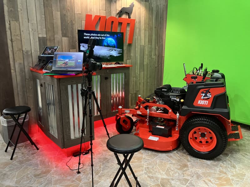 Tampa green screen photo booth for Kioti Tractors A customized Tampa green screen photo booth for Kioti tractors. A 10' green screen was placed in back of a zero turn radius tractor at a local farm show.